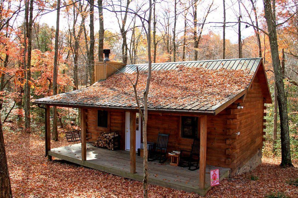 Almost Heaven Cabin Outside with Fall Leaves