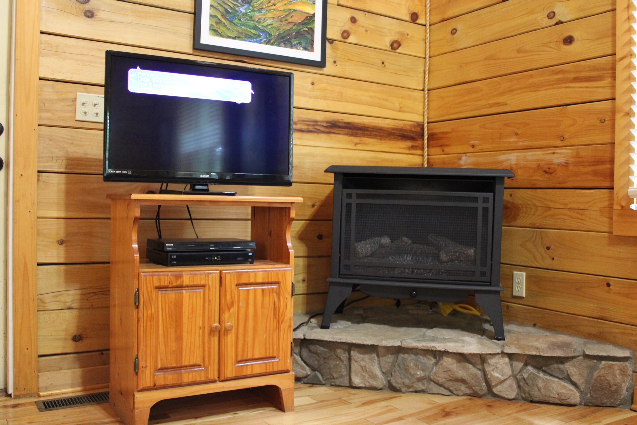 Iron Ring Cabin Living Room TV and Fireplace