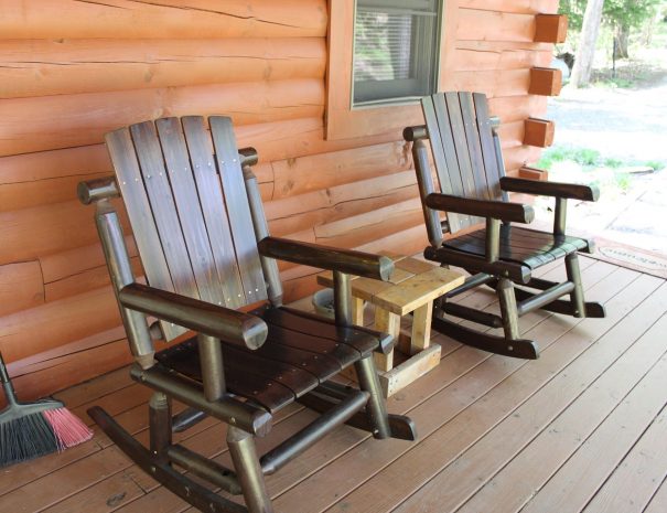Almost Heaven Cabin Rocking Chairs on Porch