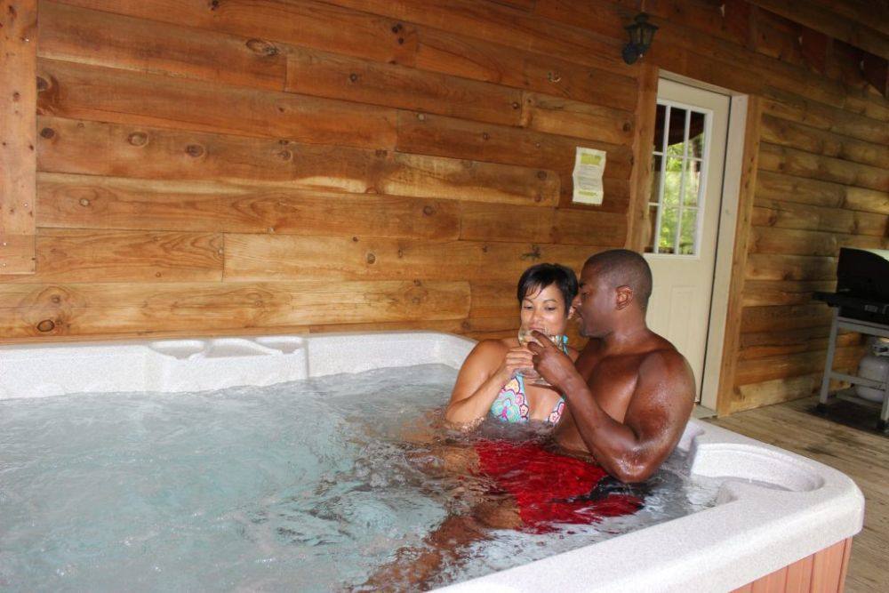 Country Road Cabins West Virginia Couple in Hot Tub