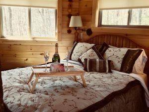 Holly Rock Treehouse Cabin King Bed with Champagne