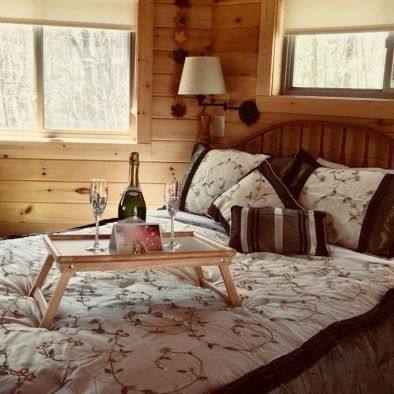 Holly Rock Treehouse Cabin King Bed with Champagne